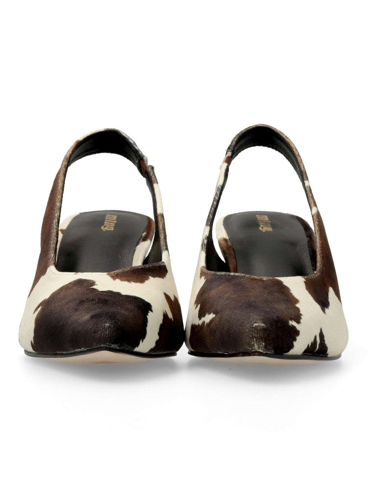 Salón Vaca Mustang